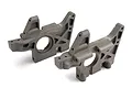 Two grey Traxxas RC front bulkhead components shown from a side angle on a white background.