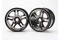 Two Traxxas 3.8 inch split-spoke RC monster truck rims in a satin chrome finish, shown against a plain white background.