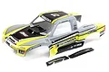 Losi 1/6 Super Baja Rey 2.0 Brenthel Edition pre-painted RC body shell in grey, yellow, and black with included front grill components.