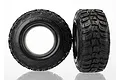 Two black Kumho Road Venture MT RC short course tyres with aggressive tread patterns, shown from front and side angles against a white background.