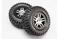 Two Traxxas RC short course wheels with BFGoodrich Mud-Terrain T/A KM2 tyres on satin chrome and black split-spoke rims.