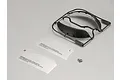 Killerbody matte black RC wheel arches on a plastic sprue with two paper cutting templates and a small bag of screws on a light grey background.