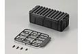 A 1/10 scale black plastic storage case with a separate sprue of hasp parts and four small screws on a grey background.