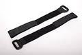 Two black hook and loop battery straps with plastic buckles, laid out on a plain white background.