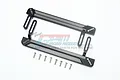 GPM Racing black aluminium side step plates for Traxxas TRX-4 with mounting hardware on a white background.
