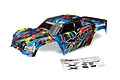 Traxxas X-Maxx 8S RC truck body shell with a blue, red, and yellow Rock 'n Roll paint scheme, including a decal sheet.