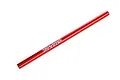A red anodized aluminium Traxxas centre drive shaft for RC vehicles, shown against a plain white background.