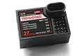 Traxxas 2216 4-channel 27MHz AM micro receiver in a black plastic case with channel pins visible.