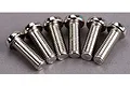 A close-up shot of six silver-coloured metal button head screws arranged in a semi-circle on a grey surface.