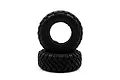 Two black rubber RC crawler tyres with aggressive tread patterns stacked on a white background.