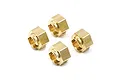 Four Yeah Racing brass 12mm wheel hex adapters arranged on a white background.