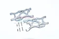 A pair of GPM Racing grey aluminium rear lower suspension arms for an RC car, shown with included mounting screws on a white background.