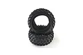 Two black Kyosho RC buggy tyres stacked on a white background.