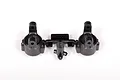 A pair of black plastic Axial C-hub carriers still attached to their original injection molding sprue, isolated on a white background.