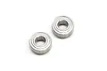 Two Kyosho 5x11x4mm metal shielded ball bearings shown from a top-down angle against a plain white background.