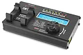 SkyRC Brushless Motor Analyzer device with a black metal casing, LCD screen, and integrated motor stand.