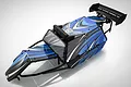 Rovan black steel Baja roll cage with blue patterned body panels, LED light bar, and a black rear wing on a white background.