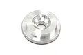 A silver-coloured Kyosho nitro engine combustion chamber insert viewed from the top, showing the threaded hole for a glow plug.
