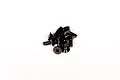 A small pile of black metal countersunk head screws with coarse threads, suitable for RC vehicle assembly.