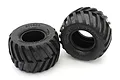 Two black Kyosho Sand Monster RC truck tyres with deep tread patterns against a white background.
