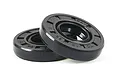 Two black rubber crankcase oil seals for an RC engine, shown stacked against a white background.