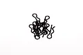 A small pile of ten black metal RC car body clips on a plain white background.