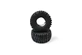 Two black Kyosho Mad Grip RC monster truck tires stacked vertically on a white background.