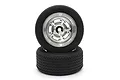 Two Kyosho 1.9-inch vintage touring car wheels with black rubber tyres and chrome-plated Rostyle-style rims stacked on a white background.