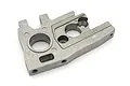 A grey metal Kyosho motor mount for the 1/8 Inferno MP9 RC car, shown from an angled top-down perspective against a white background.