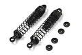 Two black RC shock absorbers with springs and four small black plastic spacers on a white background.