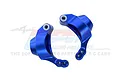Two blue anodized aluminium rear hub carriers for an RC car, shown against a white background with a faint GPM Racing logo watermark.
