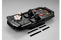 Killerbody 1/10 scale touring car cockpit set with a driver figure, black interior, and included velcro mounting strips on a grey background.