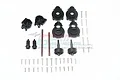 GPM Racing black aluminium rear suspension and drivetrain upgrade parts for RC cars, including differential covers, gears, shafts, and various screws.