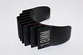 A black aluminium motor heat sink with 18mm engraved on the side, designed for RC car motors.
