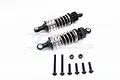 Two black GPM Racing aluminium RC shock absorbers with silver springs and included mounting hardware on a white background.