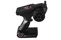 A black UDI RC 2.4GHz pistol-grip radio transmitter for RC vehicles, shown from a side angle against a white background.