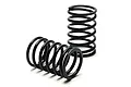 Two black metal coil shock springs for RC cars, one standing upright and one lying on its side against a white background.