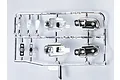 A chrome-plated plastic parts tree containing light buckets for a 1/10 scale RC car body, set against a plain white background.