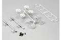 Killerbody 1/10 scale RC truck accent light parts including chrome light buckets, grilles, clear lenses, and small screws on a grey background.