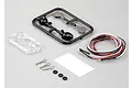 Killerbody 1/10 scale touring car wing mirror set including plastic parts tree, LED light wires, body clips, and small rubber O-rings on a grey background.