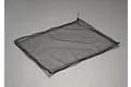 A rectangular black elastic luggage net for RC vehicles, laid flat on a neutral grey surface.