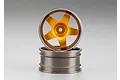 Two gold and silver aluminium RC drift rims stacked on a plain grey background.