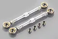 Two silver aluminium steering linkage turnbuckles with rod ends and four small metal spacers, set against a plain grey background.
