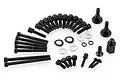 A collection of various black metal screws, bolts, washers, and a hex standoff for an RC engine hardware kit.