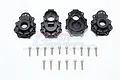 A set of four black aluminium rear portal drive housings for an RC car, accompanied by a collection of silver mounting screws on a white background.