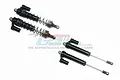 A set of four GPM Racing black aluminium L-shape piggyback shock absorbers for RC cars, shown with two assembled with springs and two without.