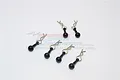 A set of six black RC body clips with easy-pull tabs arranged on a white background with a faint GPM Racing logo watermark.