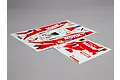 Two sheets of Motul Autech Nissan racing decals for RC car bodies on a grey background.