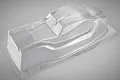A clear, unpainted polycarbonate body shell for a 1/8 scale Kyosho Inferno ST-RR Evo.2 RC truggy, shown from a high-angle studio perspective.