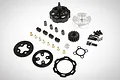 A Rovan RC clutch assembly kit including a clutch bell, pinion gear, clutch shoes, springs, and various mounting hardware on a white background.